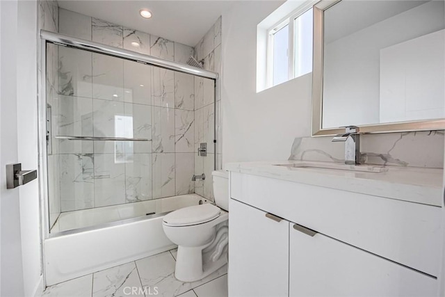 full bath with vanity, recessed lighting, bath / shower combo with glass door, toilet, and marble finish floor