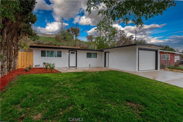 ranch-style house with concrete driveway, fence, a garage, and stucco siding