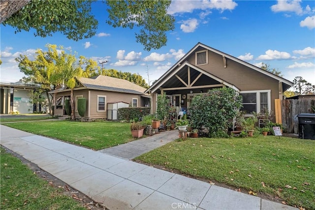 428 E E St, Ontario, CA 91764 - view of front of house with a front lawn and fence