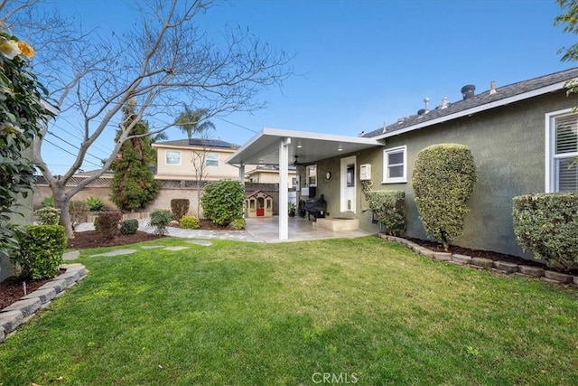 view of yard featuring a patio and fence