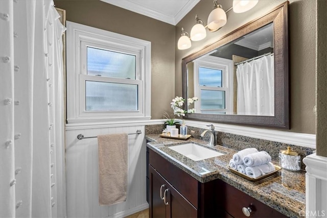 bathroom featuring vanity and crown molding