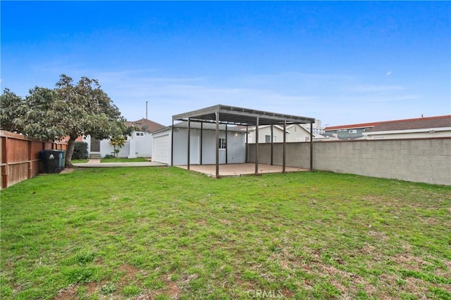 view of yard with a patio area, a fenced backyard, and a lanai