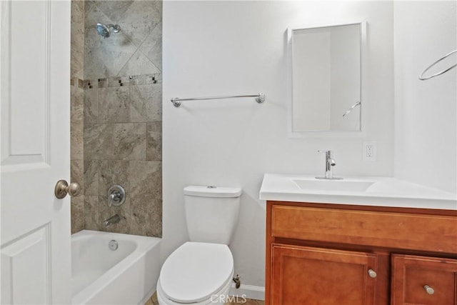 bathroom with shower / bathtub combination, toilet, and vanity