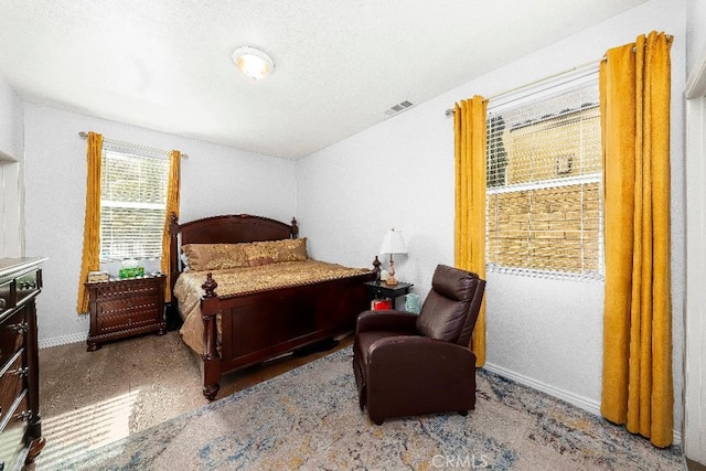bedroom featuring baseboards