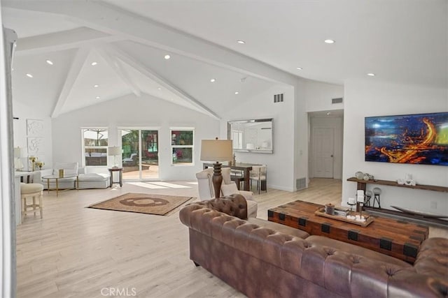 living area with visible vents, high vaulted ceiling, beamed ceiling, and light wood-style flooring