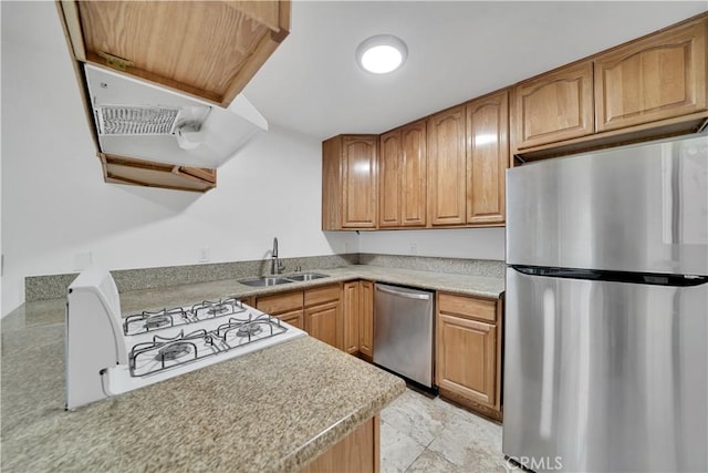 kitchen with a sink, light countertops, brown cabinets, and stainless steel appliances