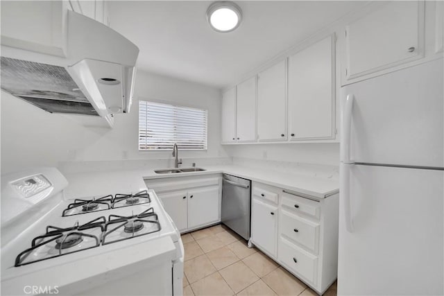 kitchen featuring a sink, white cabinetry, white appliances, light countertops, and light tile patterned floors