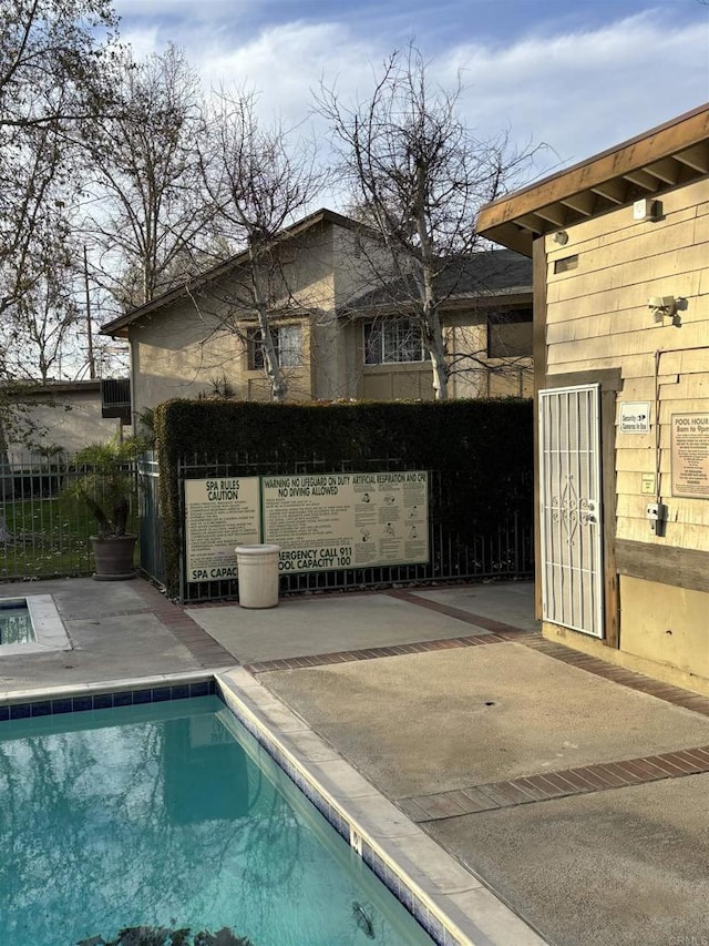 1169EAST Cornell Ave Unit 52, Redlands, CA 92374 - pool featuring a patio area and fence