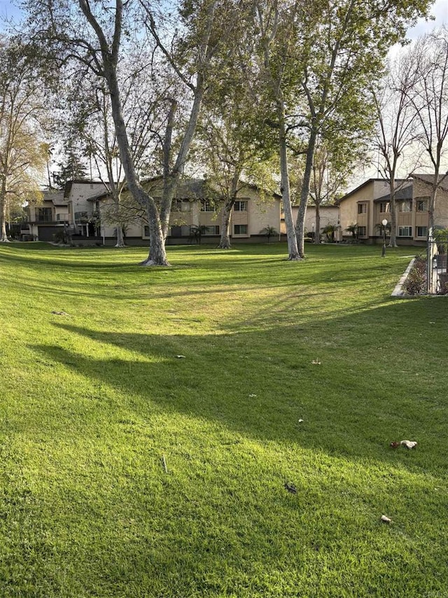 1169EAST Cornell Ave Unit 52, Redlands, CA 92374 - view of yard with a residential view