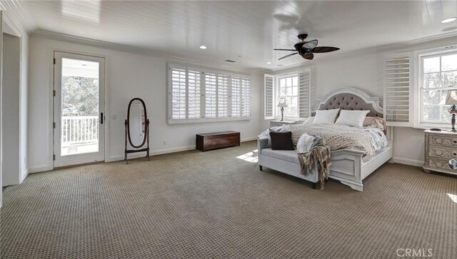 bedroom featuring carpet floors, access to outside, multiple windows, and baseboards