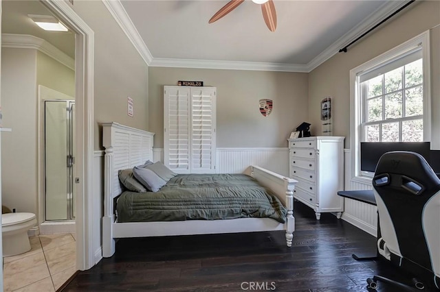 4 Andromeda Isle, Ladera Ranch, CA 92694 - bedroom with crown molding, connected bathroom, wood finished floors, and a ceiling fan