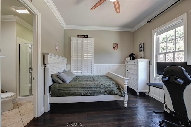 4 Andromeda Isle, Ladera Ranch, CA 92694 - bedroom featuring ornamental molding, ensuite bath, wood finished floors, and a ceiling fan