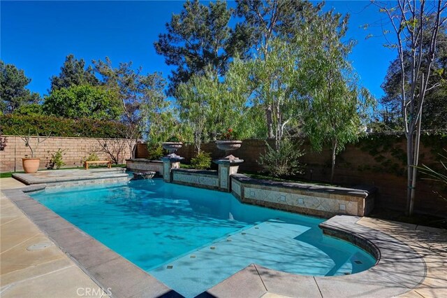 view of swimming pool with a fenced backyard and a fenced in pool