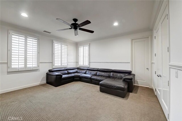 carpeted living area with recessed lighting, visible vents, a ceiling fan, and baseboards