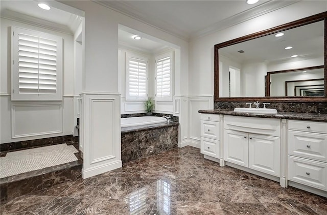 4 Andromeda Isle, Ladera Ranch, CA 92694 - bathroom with a decorative wall, marble tiled flooring, crown molding, vanity, and wainscoting