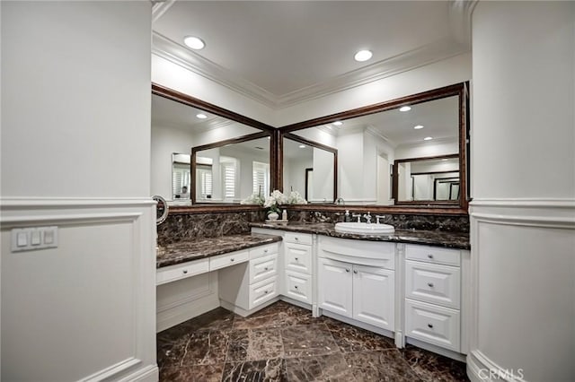 4 Andromeda Isle, Ladera Ranch, CA 92694 - full bathroom featuring ornamental molding, vanity, marble finish flooring, and recessed lighting