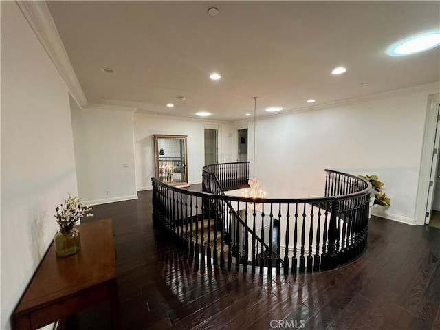 4 Andromeda Isle, Ladera Ranch, CA 92694 - hallway with an upstairs landing, wood-type flooring, crown molding, and recessed lighting