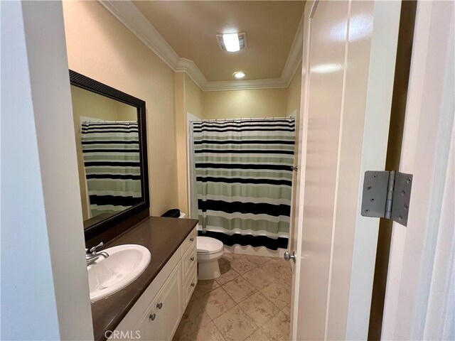 bathroom featuring curtained shower, tile patterned floors, toilet, vanity, and ornamental molding
