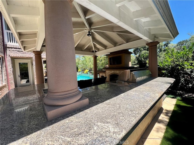4 Andromeda Isle, Ladera Ranch, CA 92694 - view of patio with an outdoor pool, area for grilling, and a ceiling fan