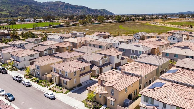 birds eye view of property featuring a residential view and a mountain view