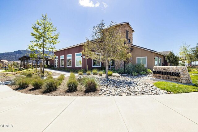 view of home's exterior with a mountain view