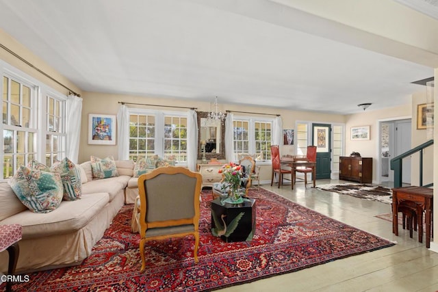 living area featuring stairs