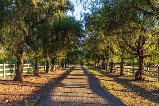 surrounding community featuring fence