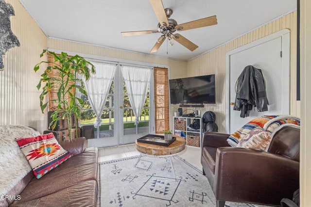 living area featuring a ceiling fan