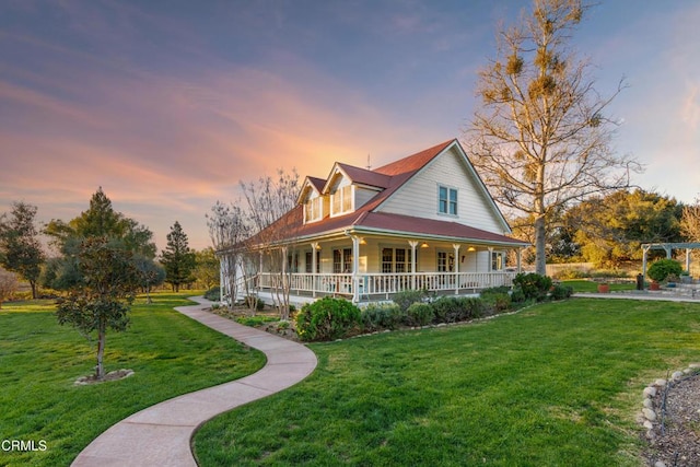 view of front of house featuring a porch and a front lawn