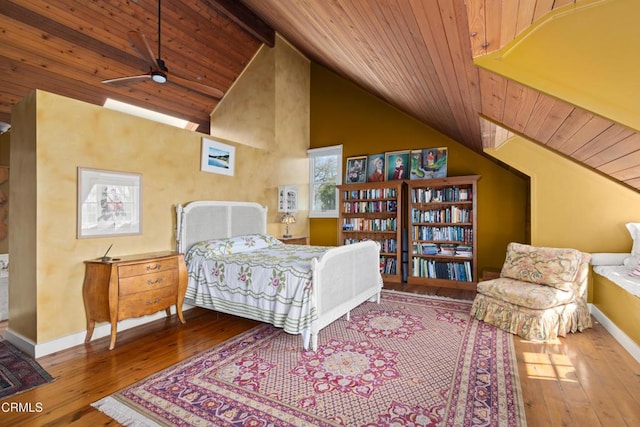 bedroom featuring wood ceiling, baseboards, wood-type flooring, and high vaulted ceiling