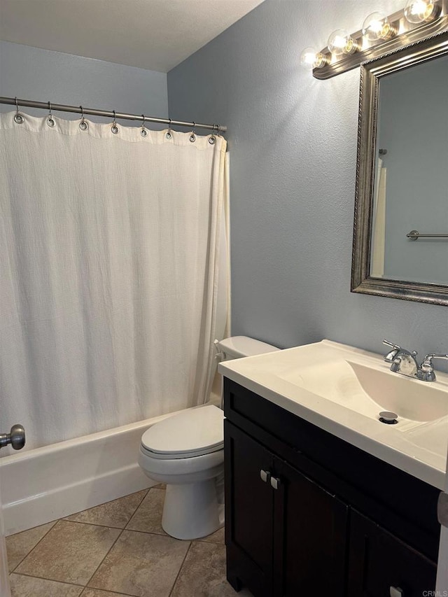 bathroom featuring vanity, shower / bath combination with curtain, toilet, and tile patterned flooring