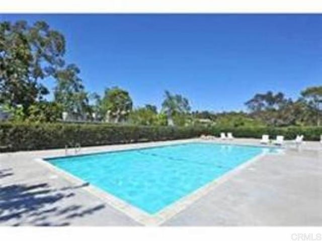 pool with a patio