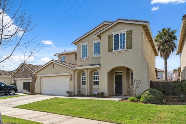 view of front of property featuring a front lawn, fence, driveway, and stucco siding