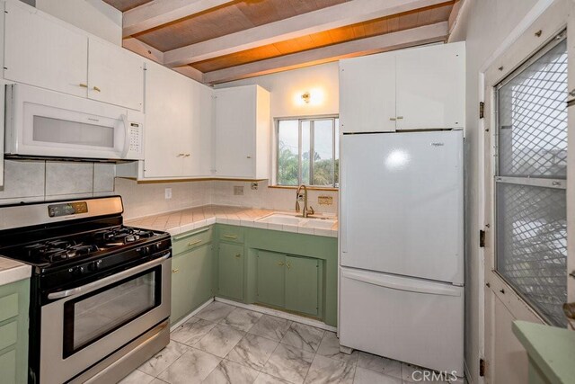 10670 Olive Grove Ave, Sunland, CA 91040 - kitchen featuring white appliances, a sink, green cabinets, tile countertops, and beamed ceiling