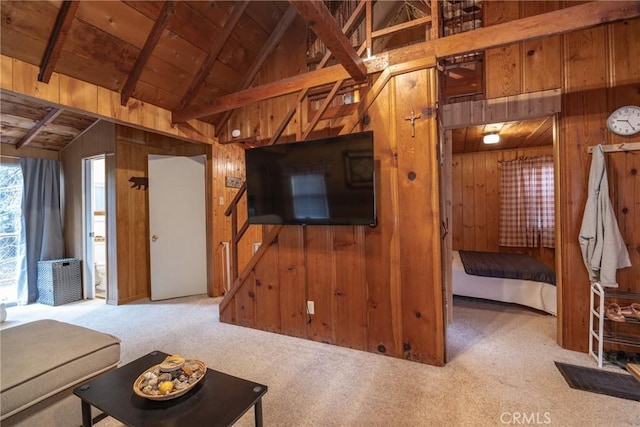 23679 Hillside Dr, Crestline, CA 92325 - carpeted living area with vaulted ceiling with beams, wooden walls, wooden ceiling, and stairs