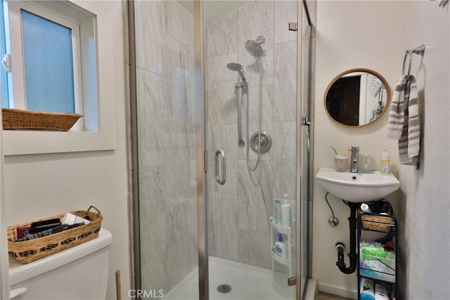23679 Hillside Dr, Crestline, CA 92325 - full bathroom featuring toilet and a shower stall