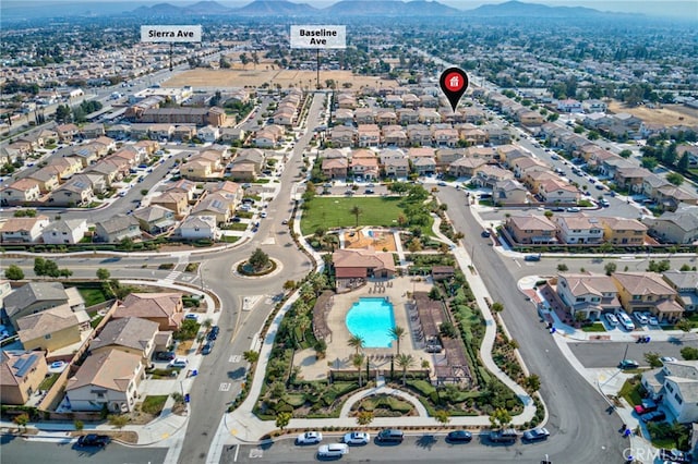 drone / aerial view with a mountain view and a residential view