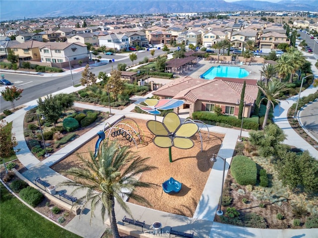 birds eye view of property with a residential view and a mountain view