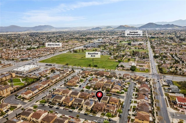 bird's eye view featuring a mountain view and a residential view