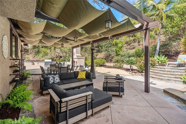 view of patio featuring an outdoor living space, grilling area, and outdoor dining area