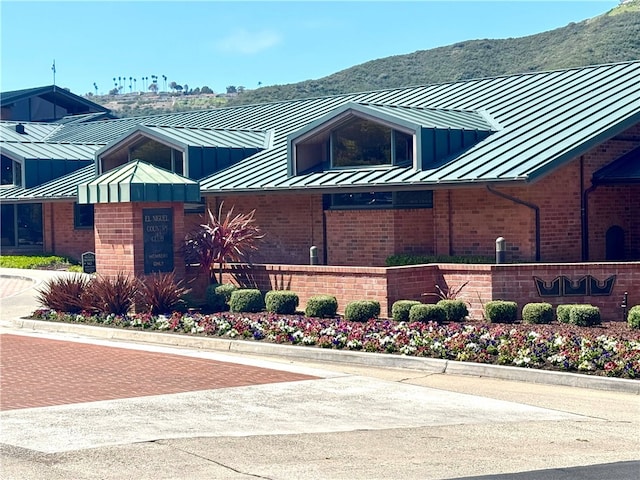 exterior space featuring a mountain view