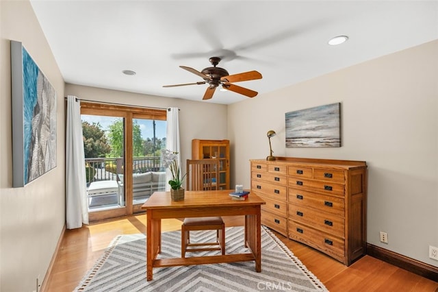 office space featuring light wood-type flooring, ceiling fan, baseboards, and recessed lighting