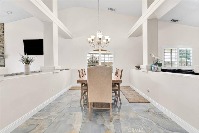 dining space with visible vents, marble finish floor, and a healthy amount of sunlight