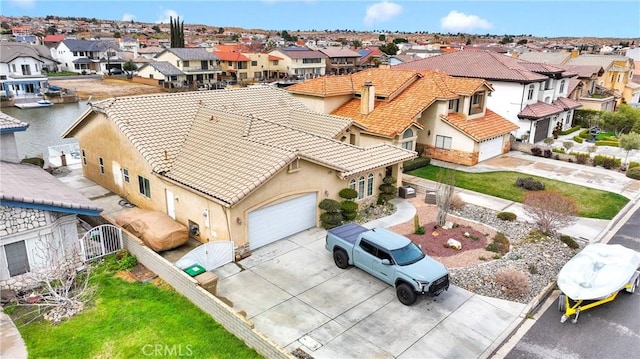 drone / aerial view with a residential view