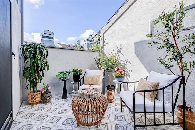 view of patio / terrace with a balcony