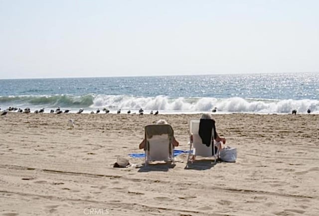 property view of water with a beach view