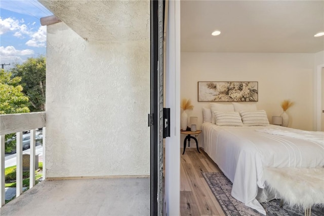 380 W Wilson St Unit A102, Costa Mesa, CA 92627 - bedroom with wood finished floors and recessed lighting