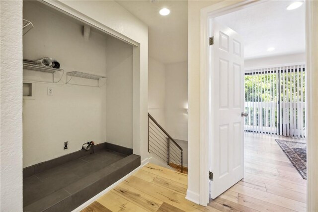 380 W Wilson St Unit A102, Costa Mesa, CA 92627 - laundry room featuring wood-type flooring and recessed lighting