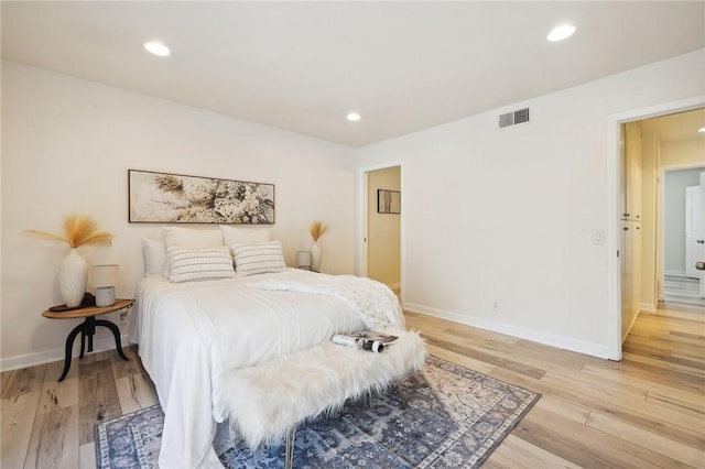 380 W Wilson St Unit A102, Costa Mesa, CA 92627 - bedroom featuring light wood finished floors and recessed lighting