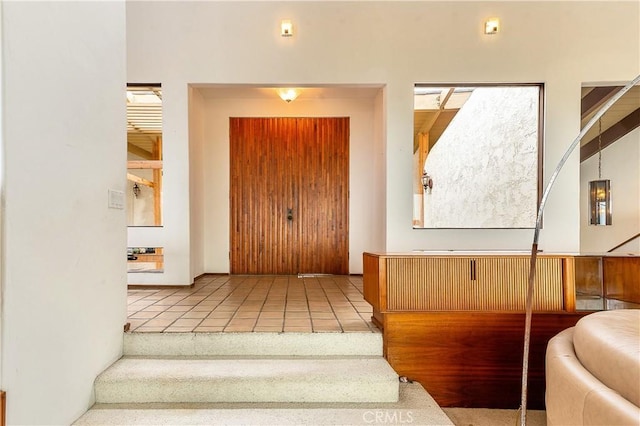 entrance foyer featuring tile patterned flooring